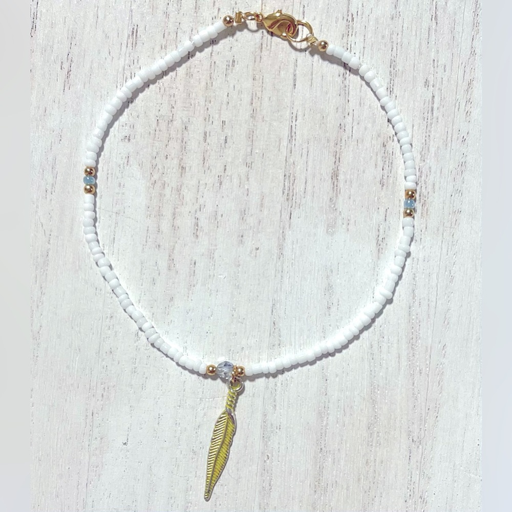 Anklet- Swarovski Crystal, glass seed beads, gold beads & feather charm